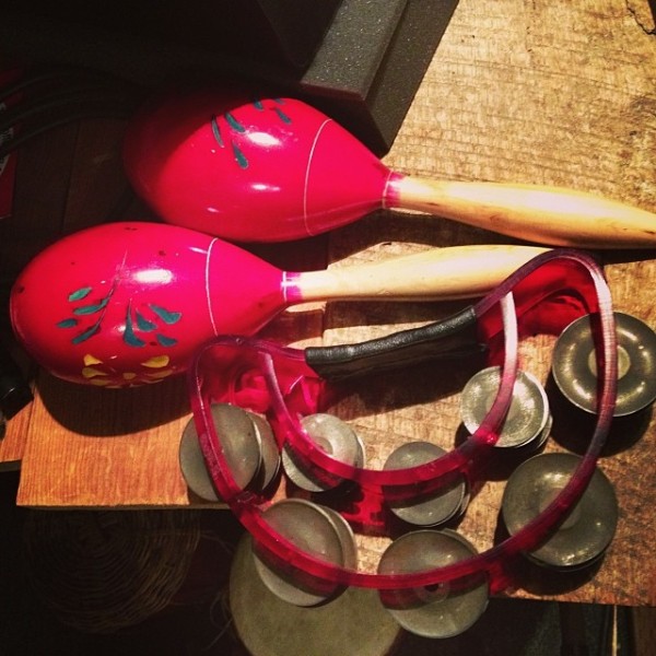 Red maracas and tambourine in studio #stilllife #joy